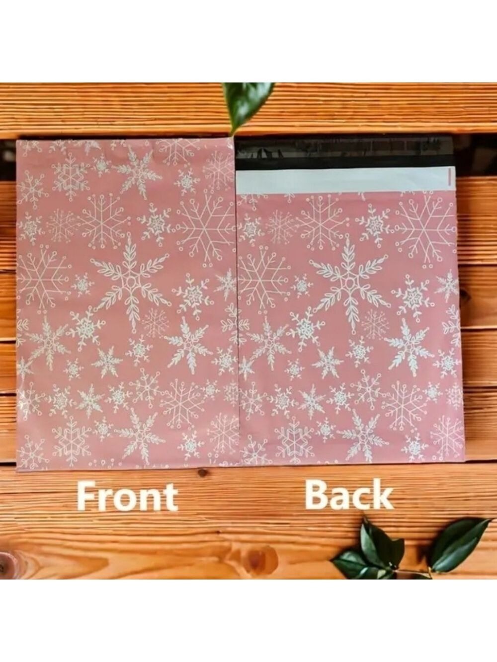 Ten pink with white snowflakes poly mailers